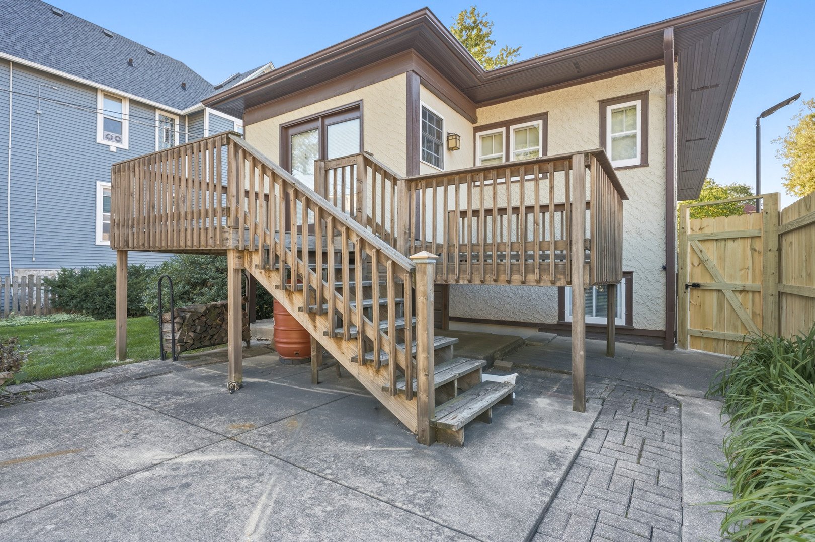Back deck and fenced patio of a 1922 Berwyn bungalow.jpg