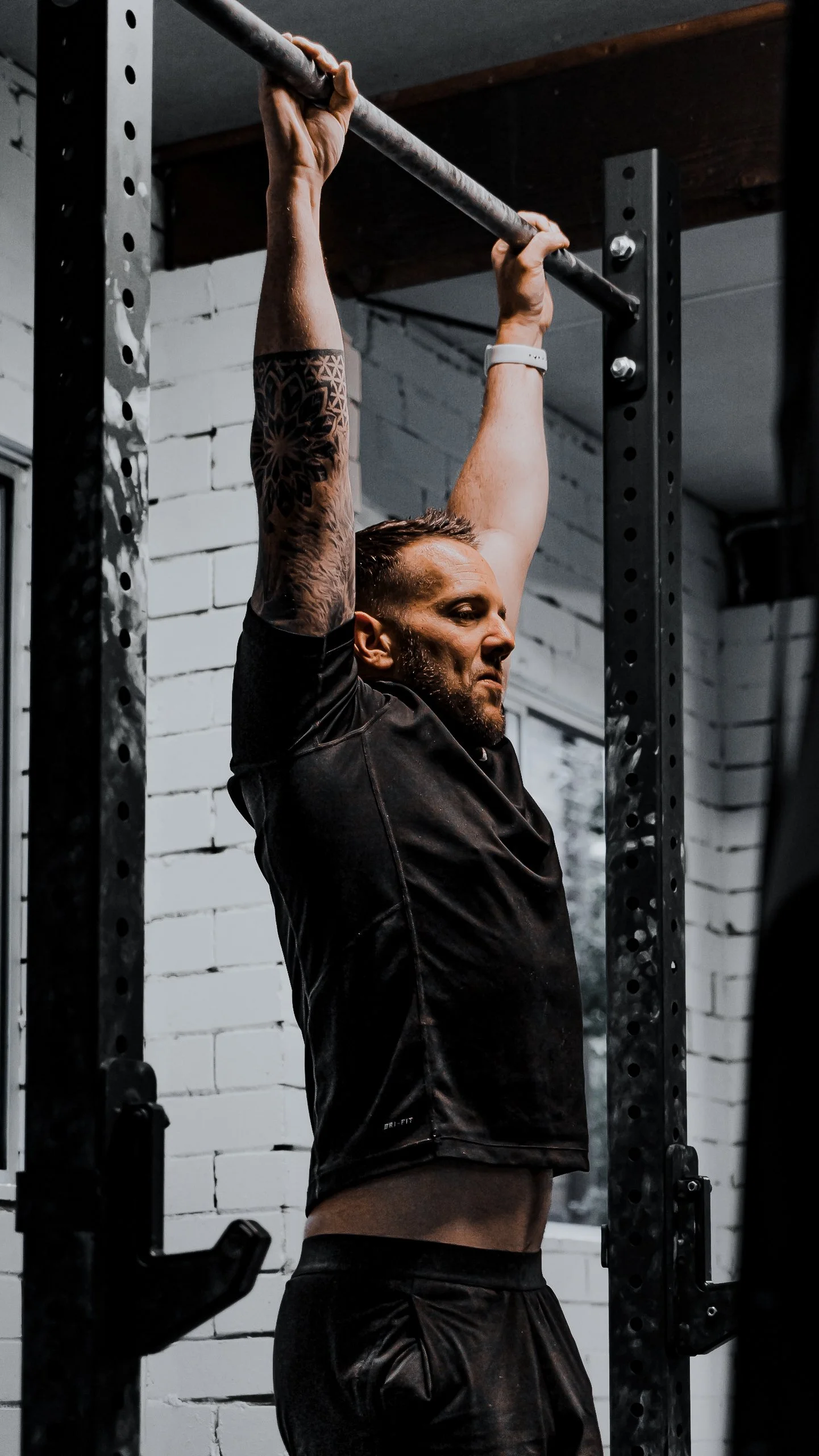 Barbell lifting practice emphasises strength, stability, and controlled movement.