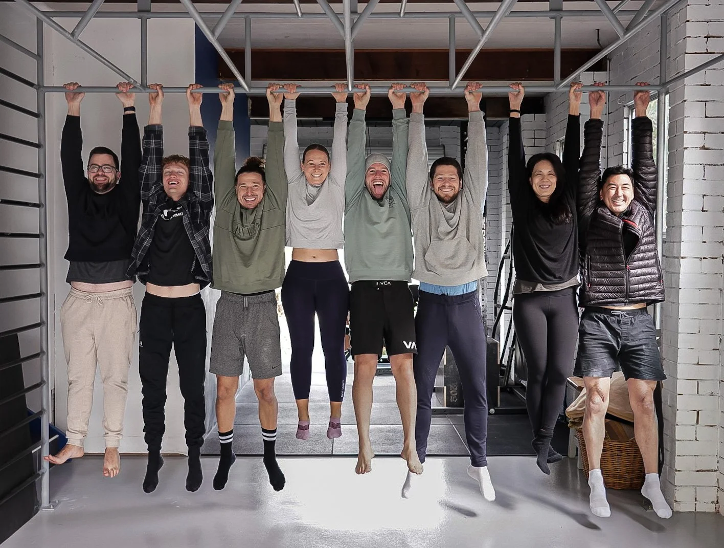 Group movement and rest session in a studio, integrating practice with recovery and reflection.