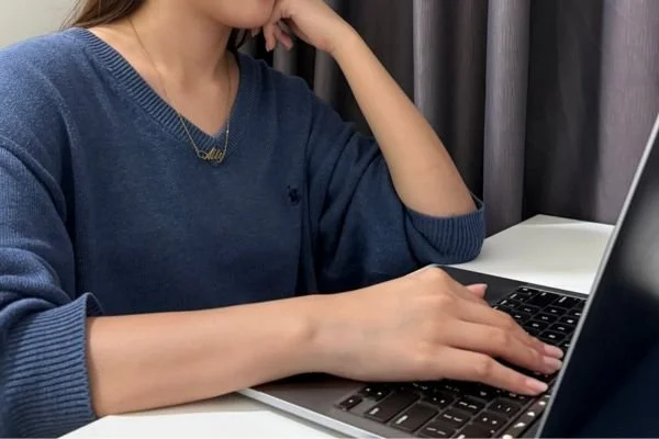 Female student using a laptop to learn Mandarin online in Malaysia