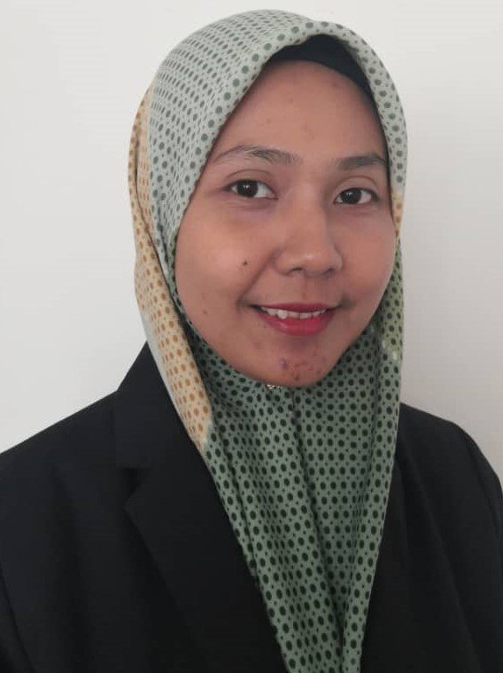 A happy female Mandarin class student smiling