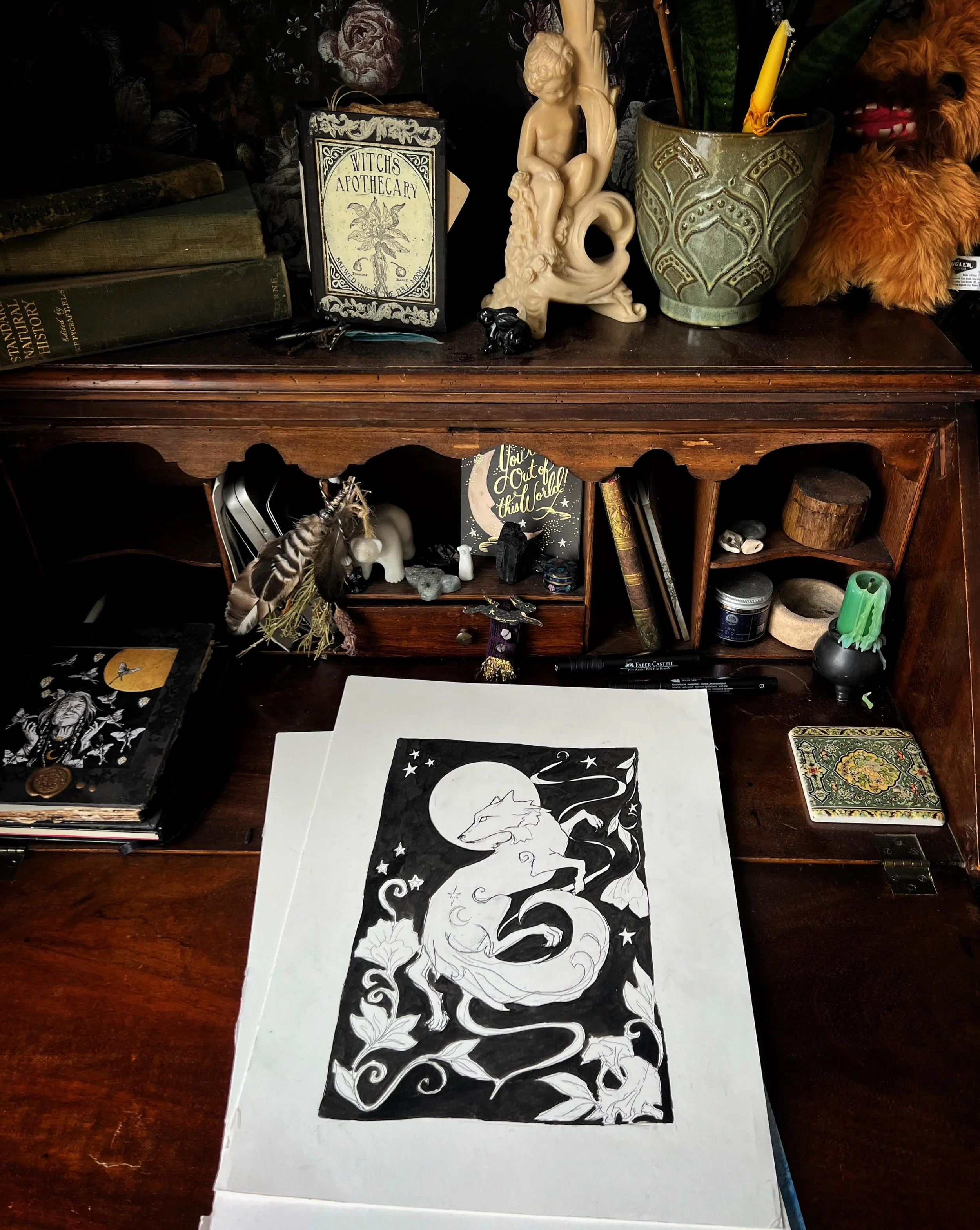 It&rsquo;s raining outside &hellip; so I&rsquo;m snuggled up with my pens, my cat and my very dusty writing desk.
I&rsquo;m not even sorry. 

#witchy #penandinkdrawing #wolf #wolfart #cottagecorestyle