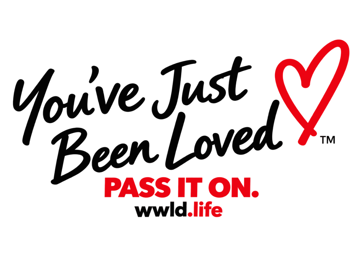 WWLD card reading: You've Just Been Loved. Pass it on. wwld.life, with a red heart.
