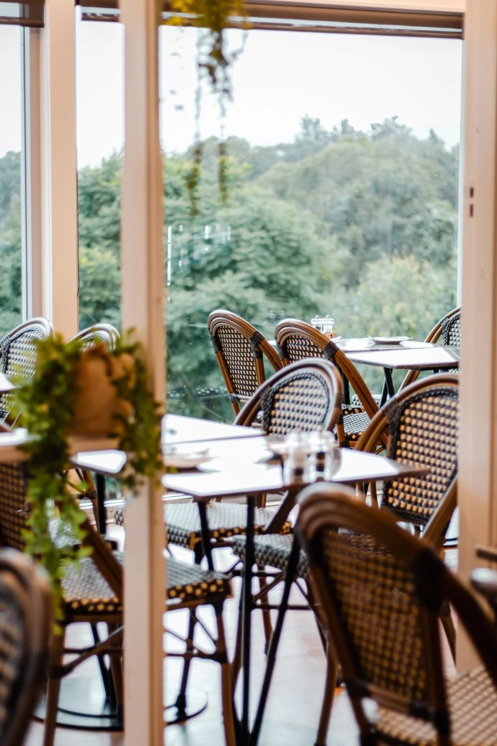 Tables set in dining area of schembraes at kurrajong overlooking the hawkesbury valley