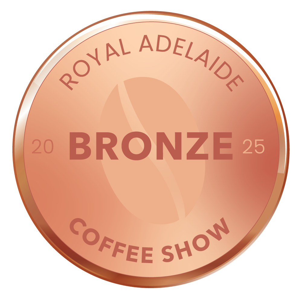 A bronze medal with the words "Royal Adelaide Coffee Show 2025" and "Bronze" inscribed on it.