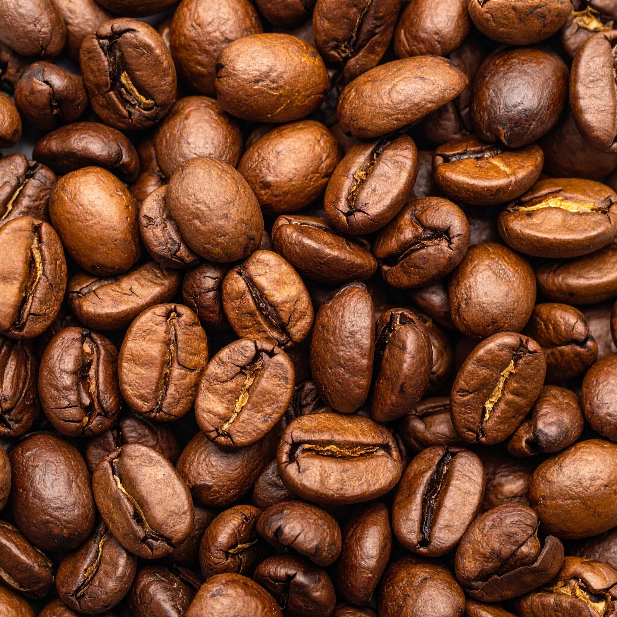 Firefly_closeup of a pile of coffee beans. texture, photography.  694114.jpg