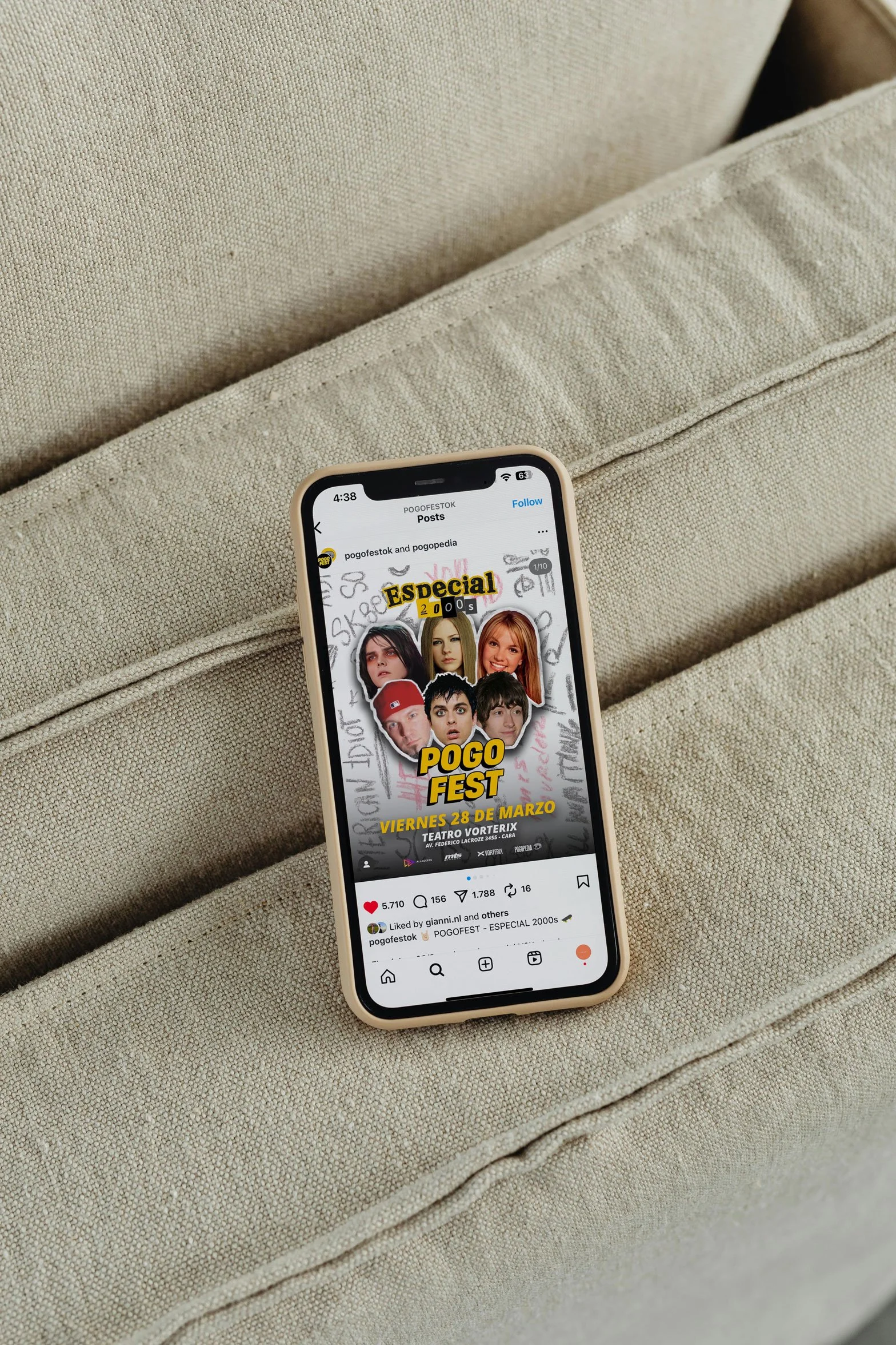 An open book on a gray surface displaying two pages with large black numbers and small lowercase instructional text.