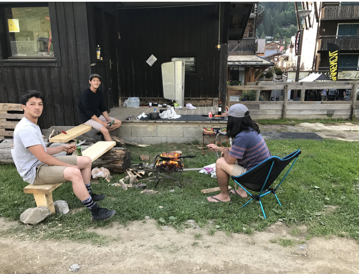 Cooking dinner over a campfire at a public BBQ spot in Europe