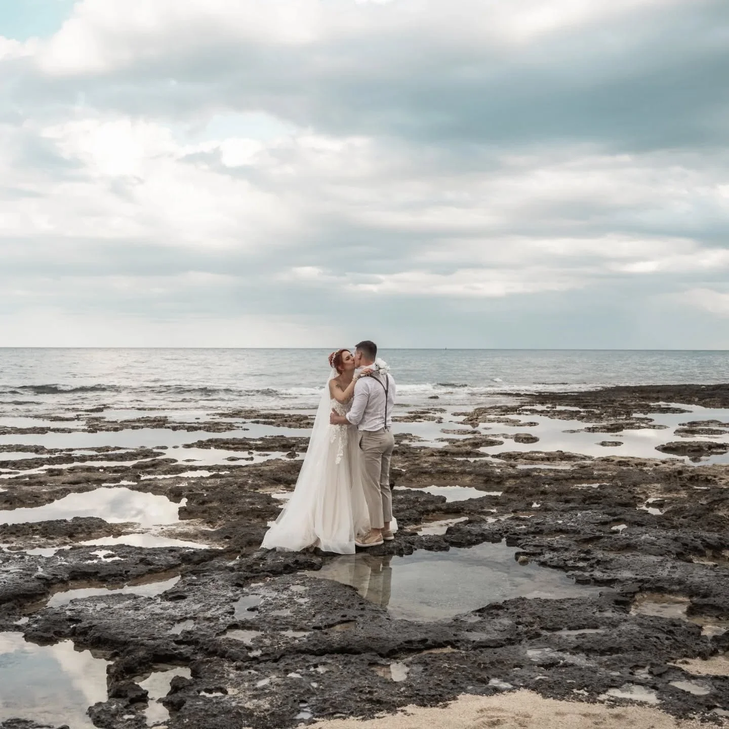 Sandy toes, salty kisses, and a love that lasts forever.💍📸
.
.
.
#CyprusWeddingPhotographer #BeachWeddingCyprus #WeddingVibes #DestinationLove #ForeverStartsHere