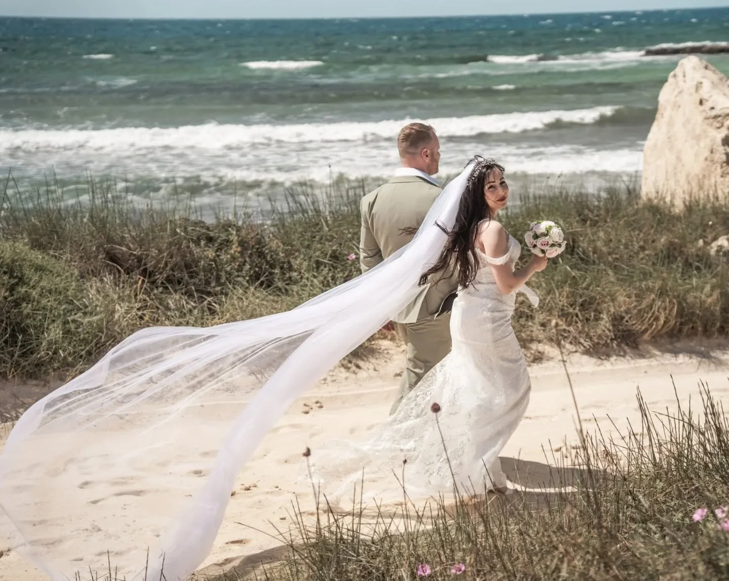 Love rolled in with the waves, and we rolled right into forever. 🌊❤️
.
.
.
#CyprusWeddingPhotographer #BeachWedding #WeddingInCyprus #LoveByTheSea #DestinationWedding JustMarried