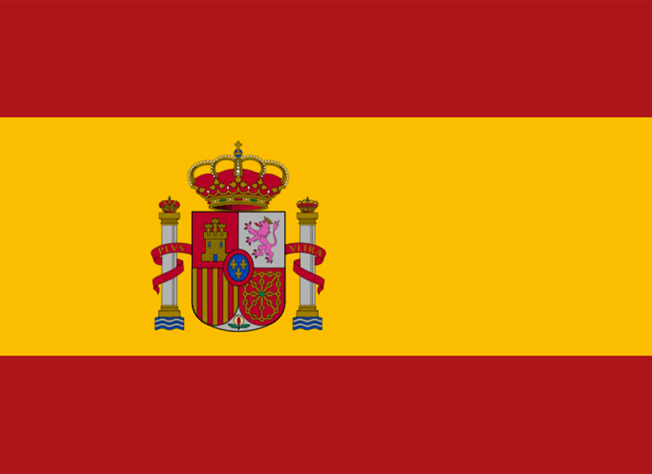 The flag of Spain with horizontal red, yellow, and red stripes and the coat of arms in the center.