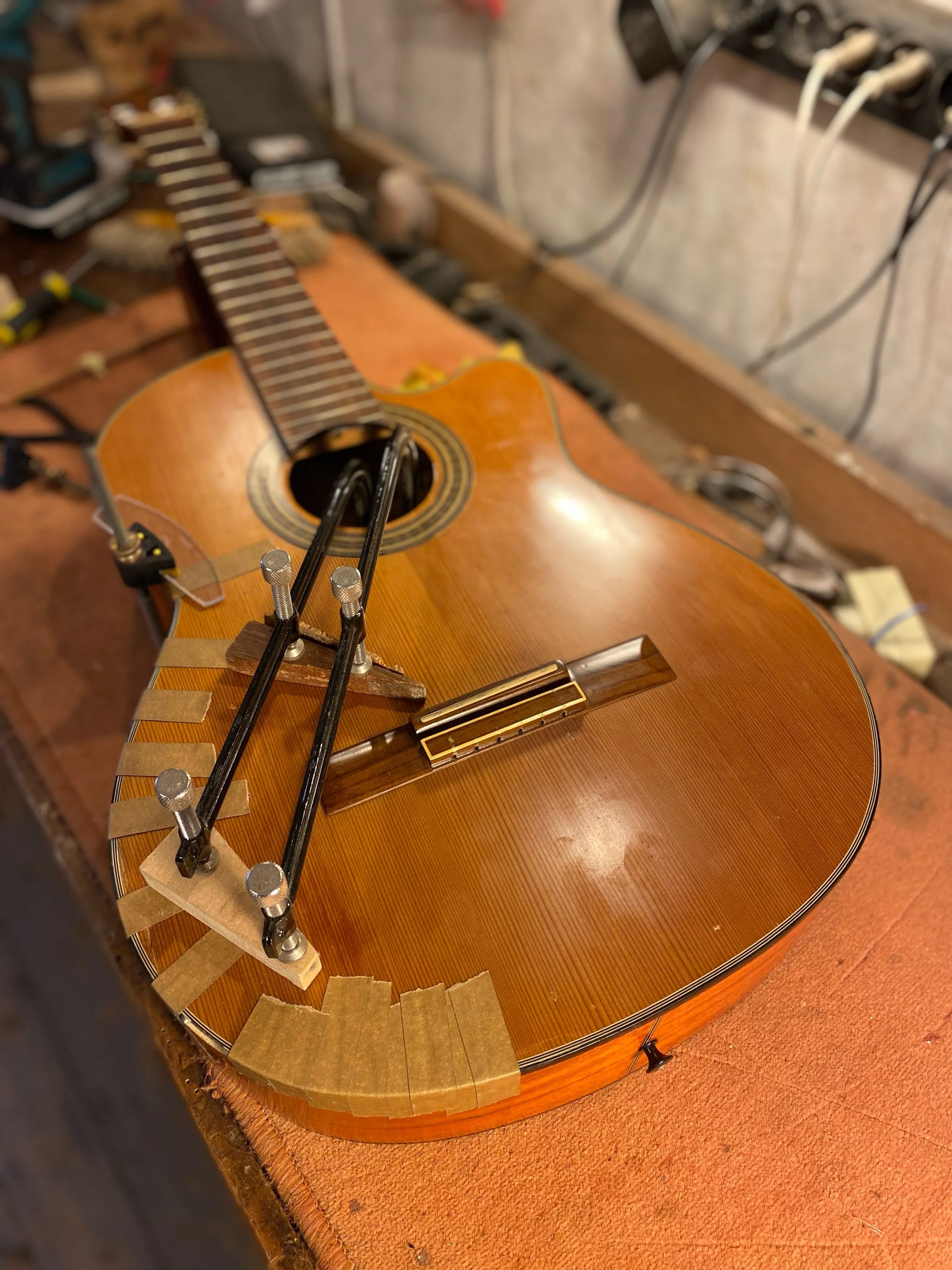 Guitar passing the workbench last week.  Fixing all kinds of stuff.  Check the last one 😊