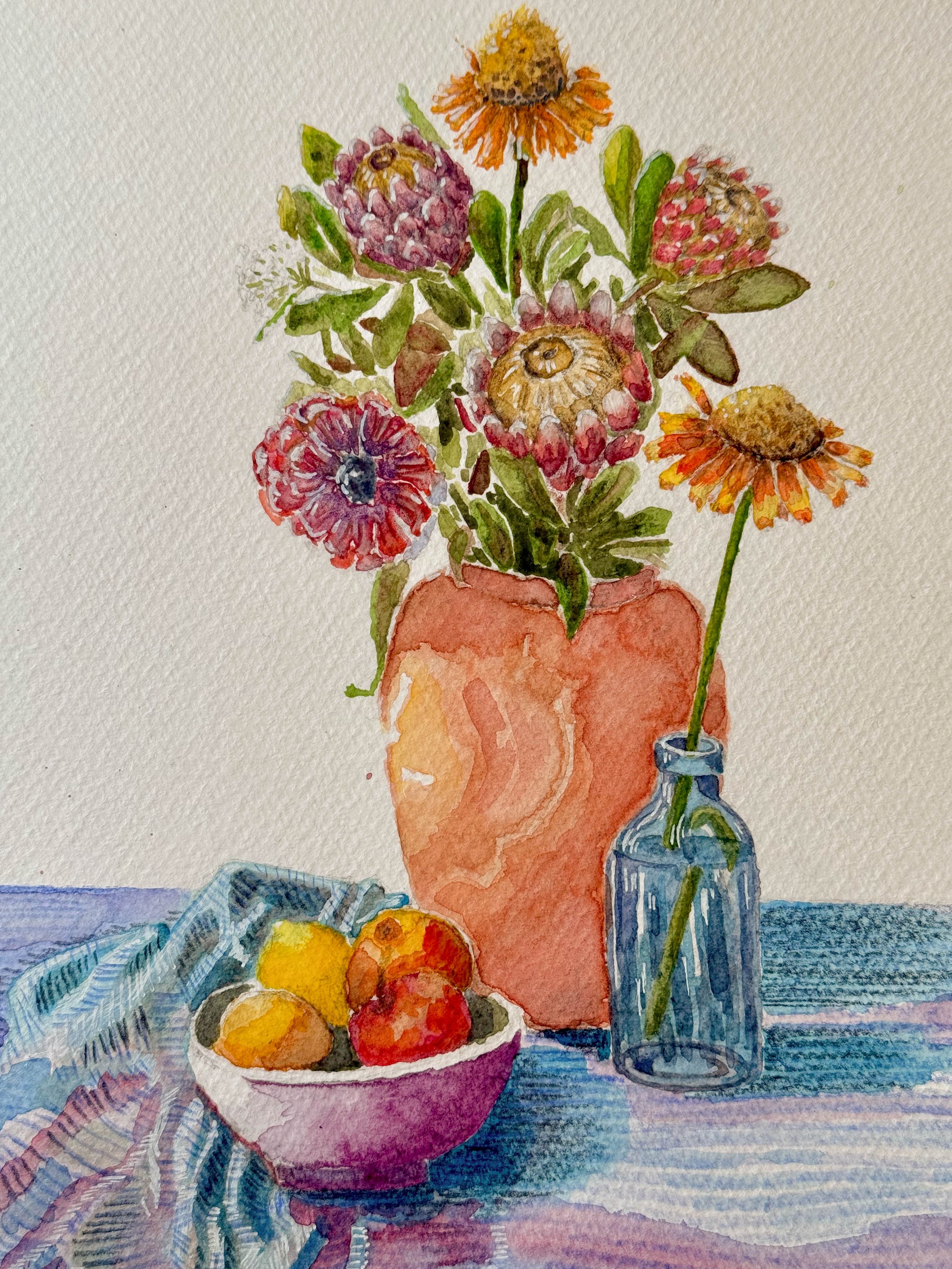 A watercolor painting of a still life scene with flowers in a glass bottle, a bowl of peaches, and a tablecloth with a checkered pattern.