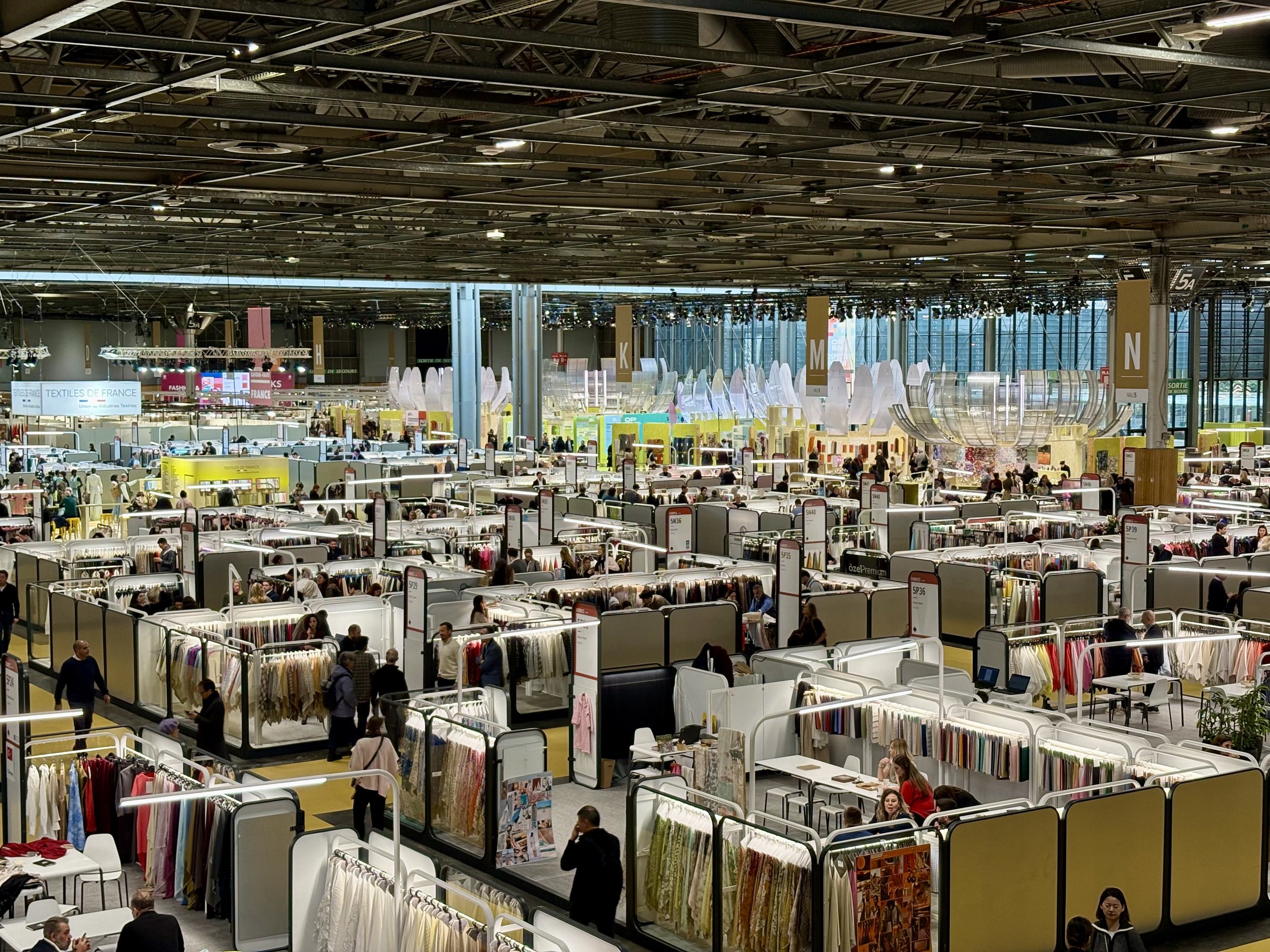 elevated view large textile fair fabric displays