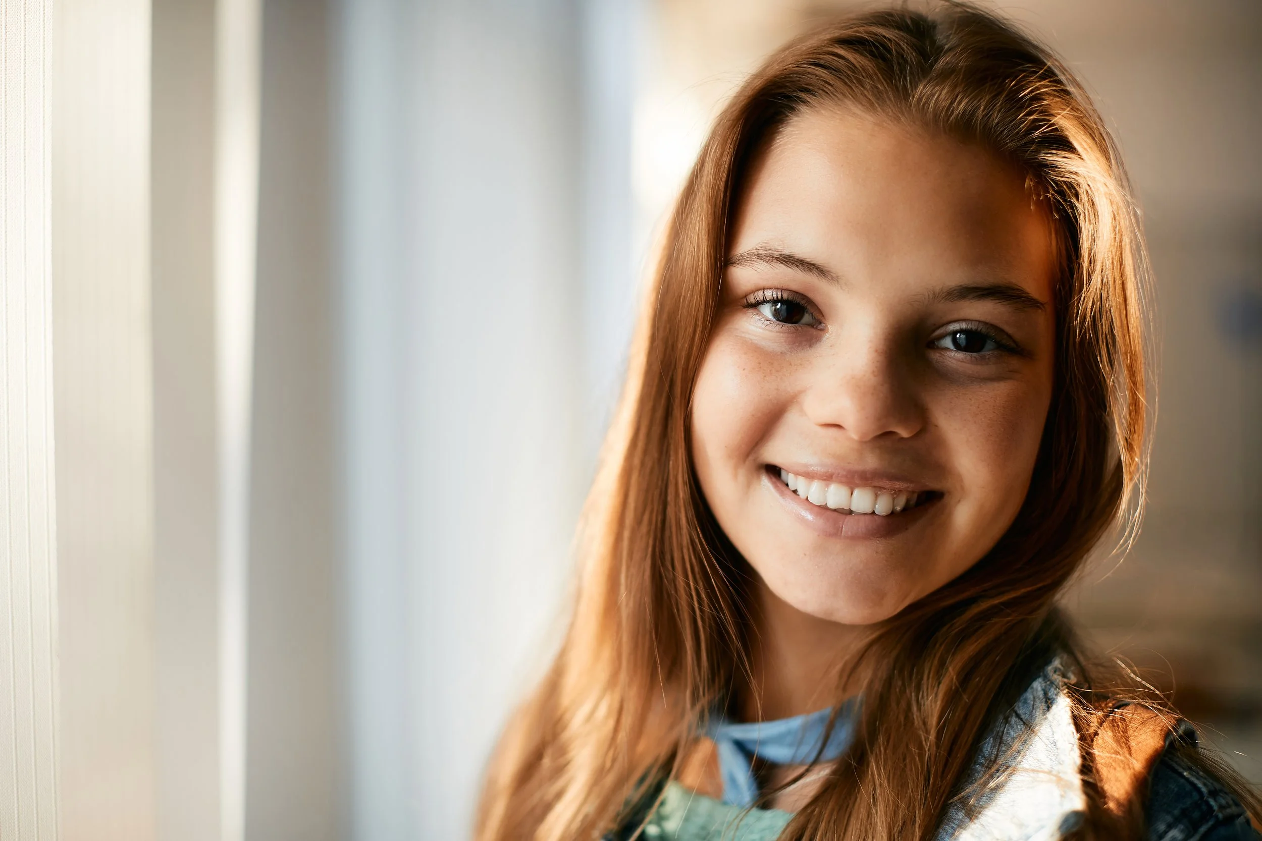 close-up-of-happy-teenage-girl-in-the-classroom-lo-2024-12-13-18-35-27-utc_web.jpg