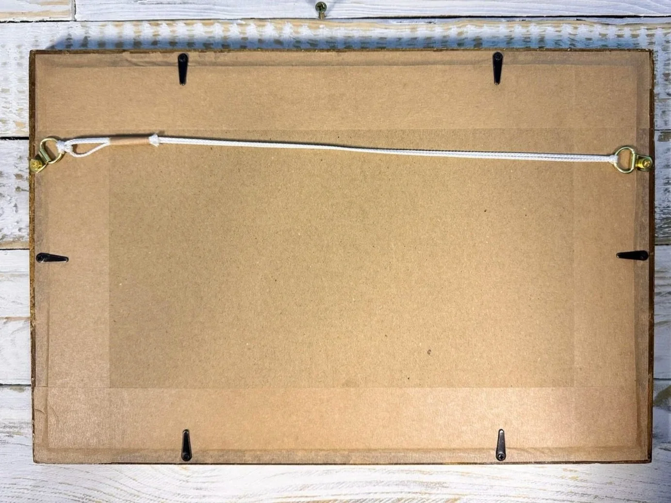 back of framed textile of vintage indonesian batik sarong