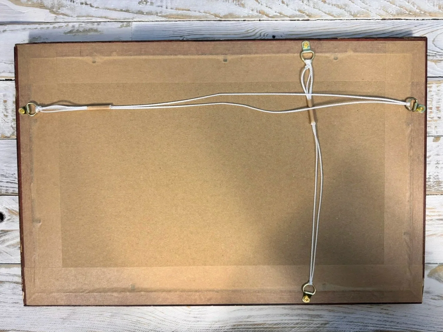 back of framed textile of vintage indonesian batik sarong