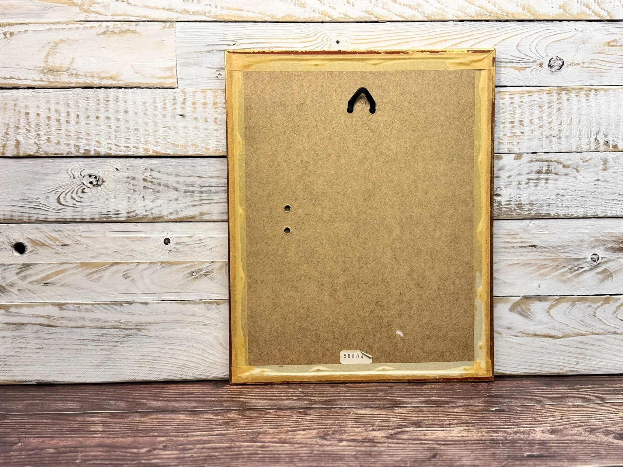 back of frame of mottled owl bird print by Fawcett in a history of british birds