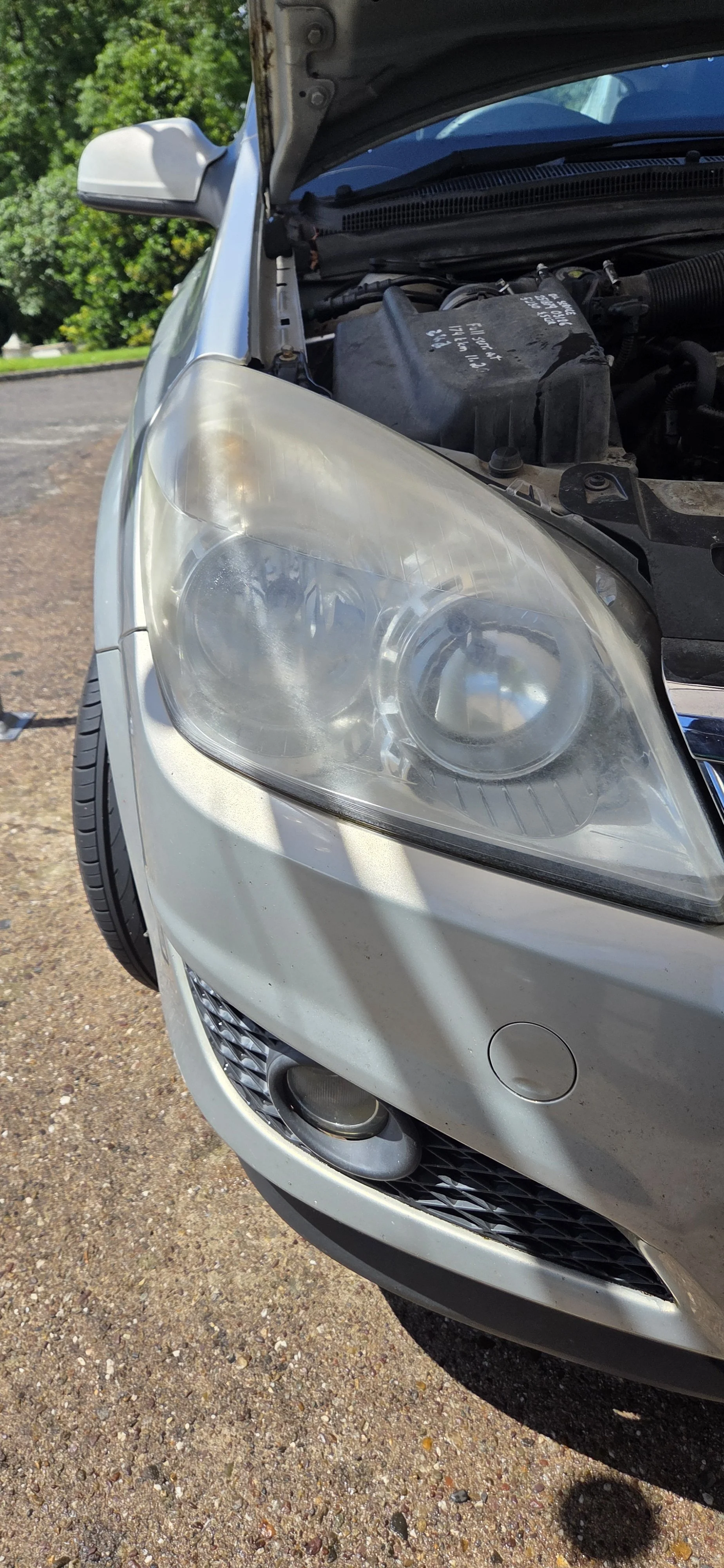 Headlight cloudy and sun damaged in need of repair