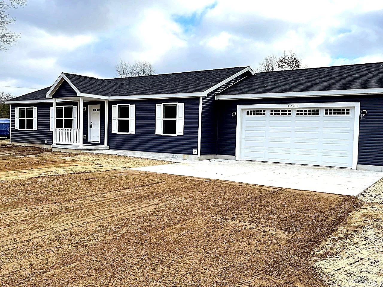 Exterior of the Pinehurst double-wide manufactured home at Valley Ridge Estates in Fremont, Michigan