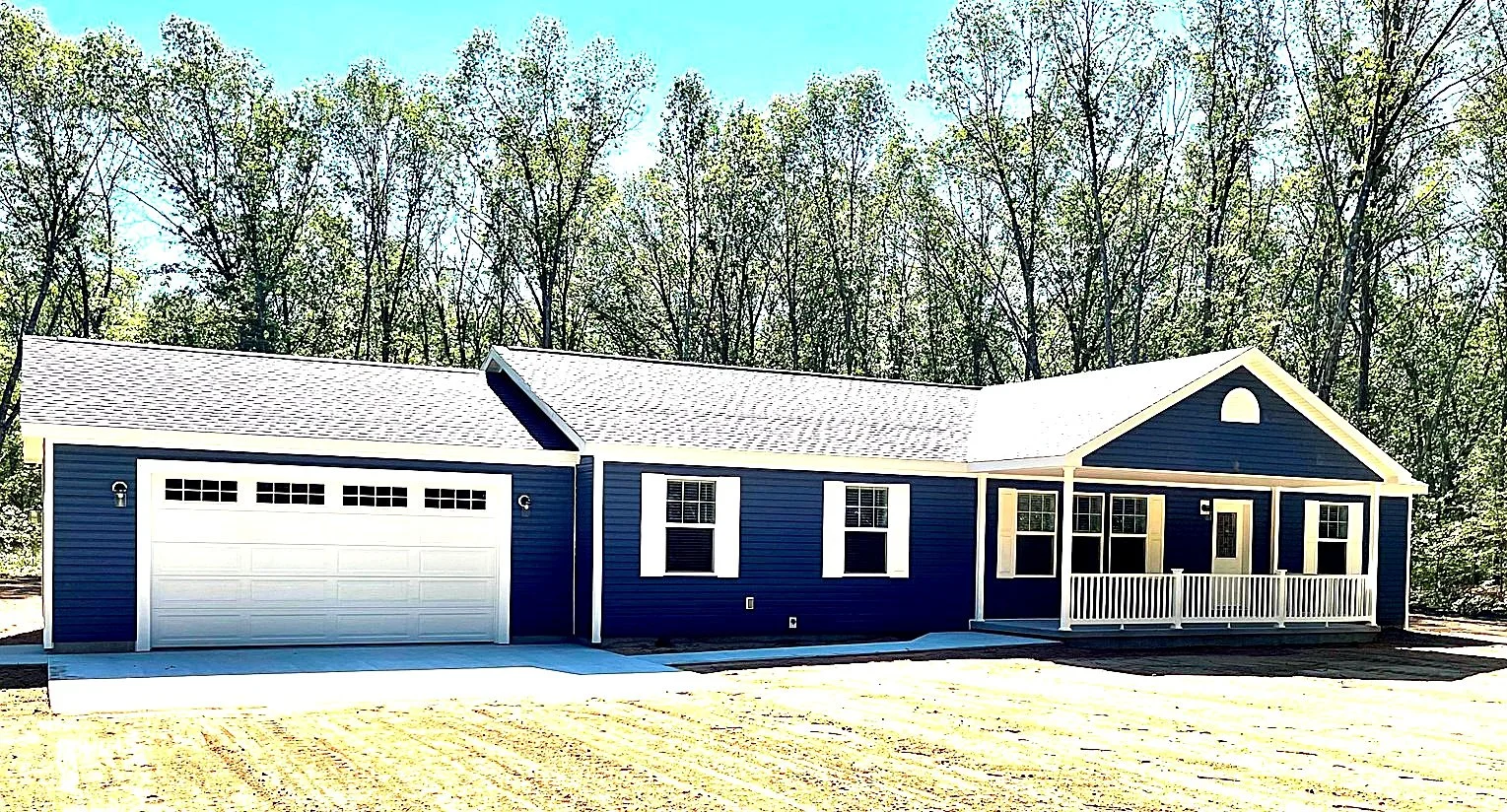 Exterior of the Quail Hollow double-wide manufactured home at Valley Ridge Estates in Fremont, Michigan