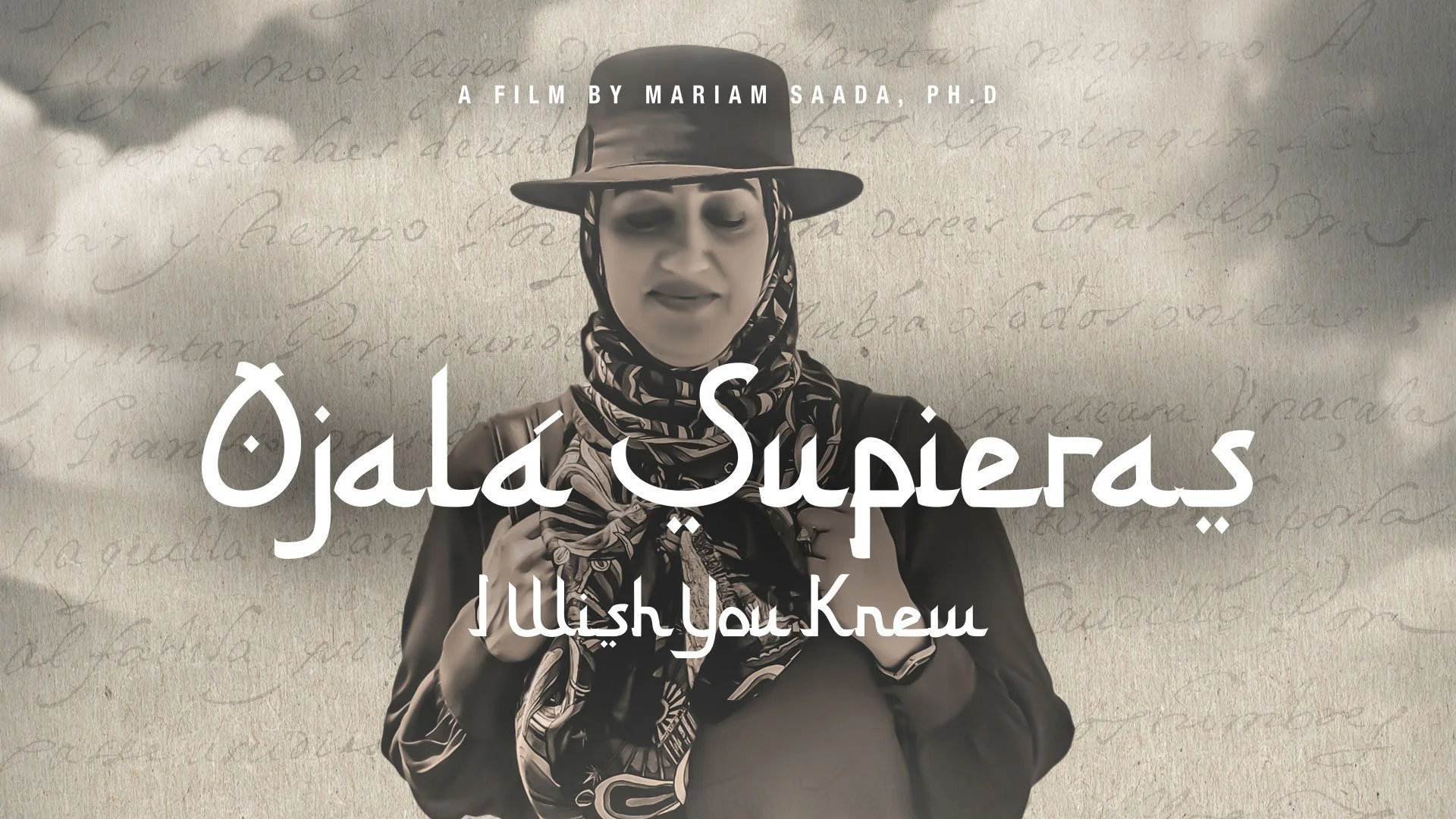 woman smiling wearing wide-brimmed hat