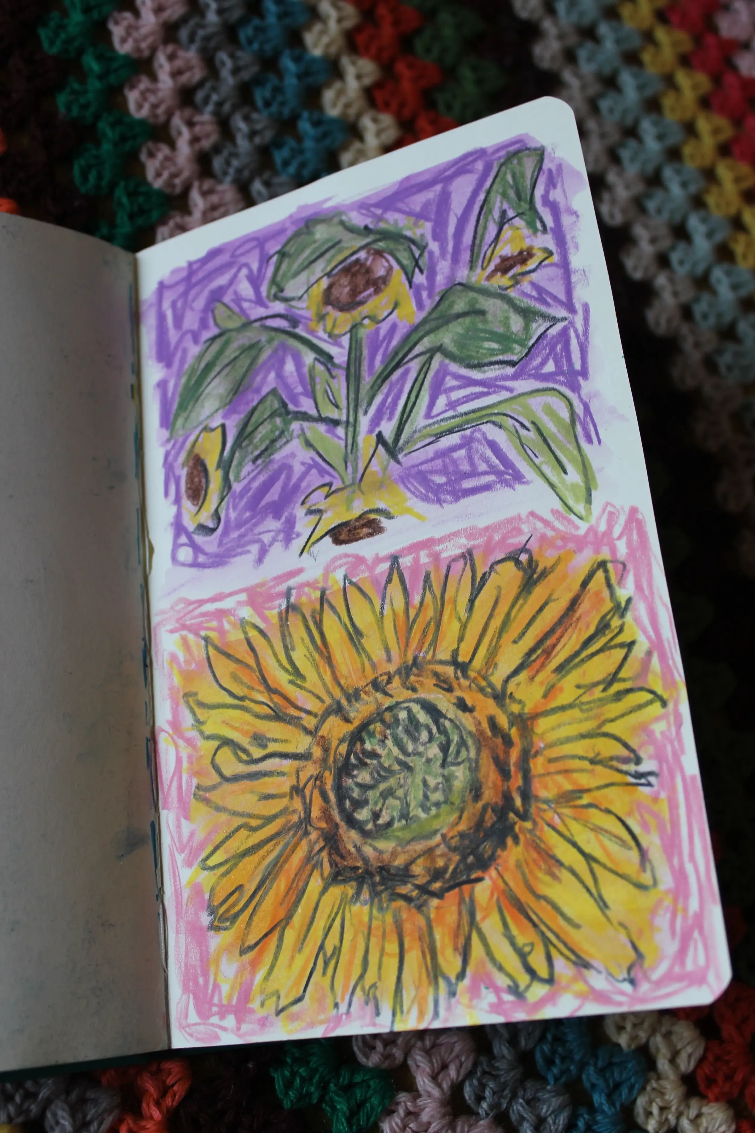 Colorful crayon drawing of sunflowers on a purple and yellow background, with a hand-drawn style.