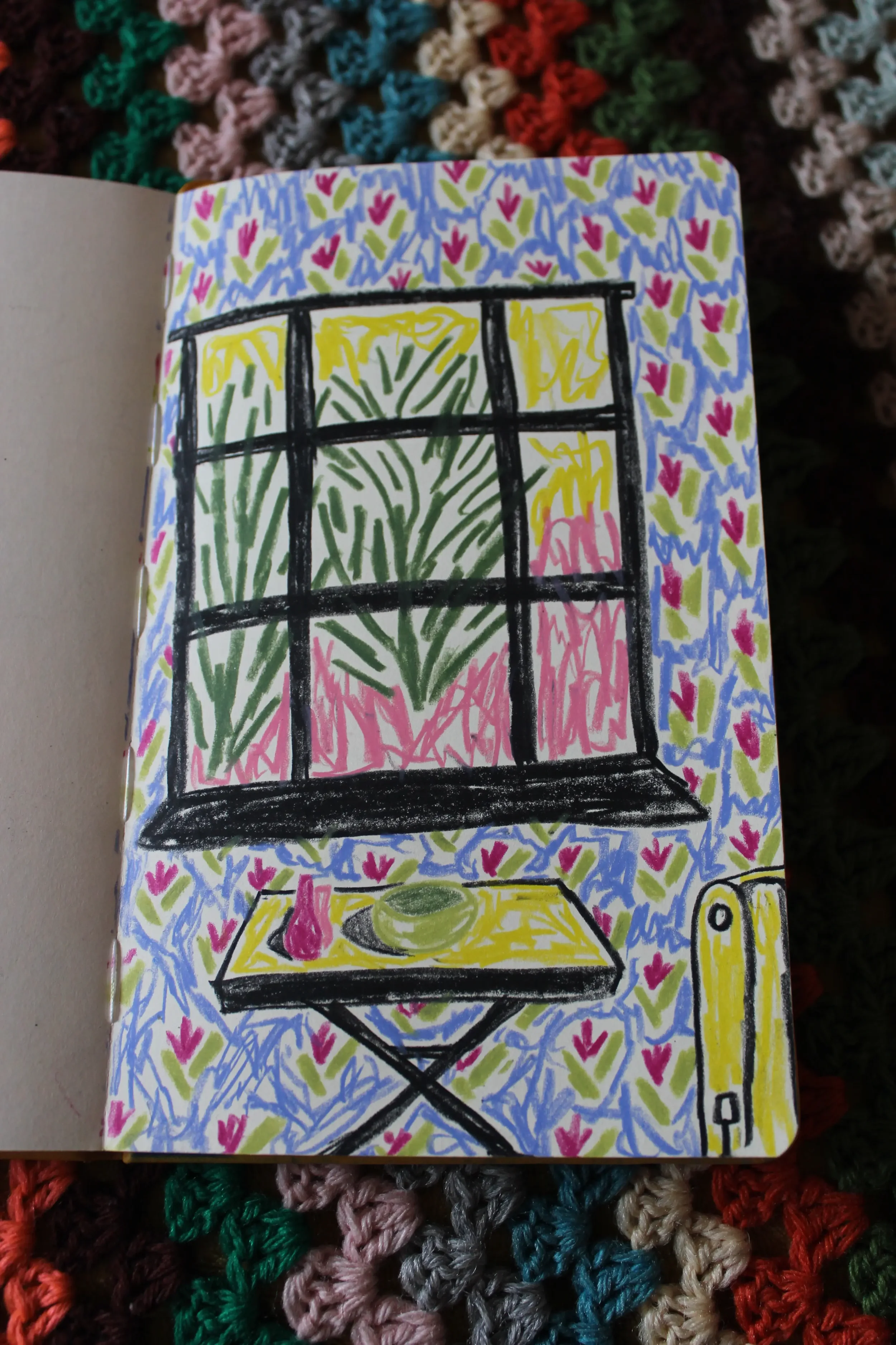 Colorful drawing of a window with a small table, surrounded by a vibrant, patterned background.