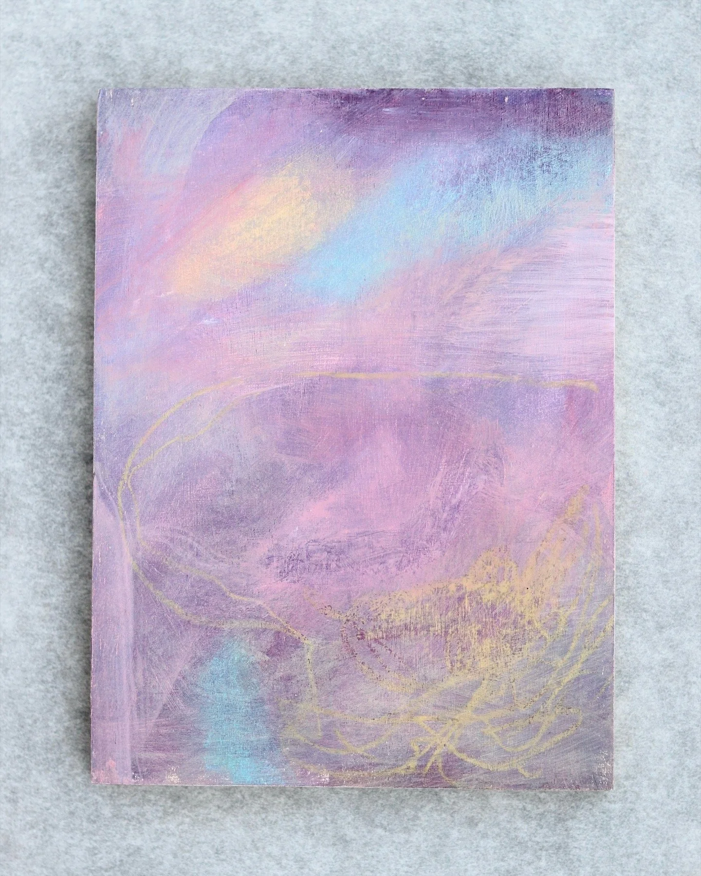 small abstract painting with colours of purple, blue and yellow 