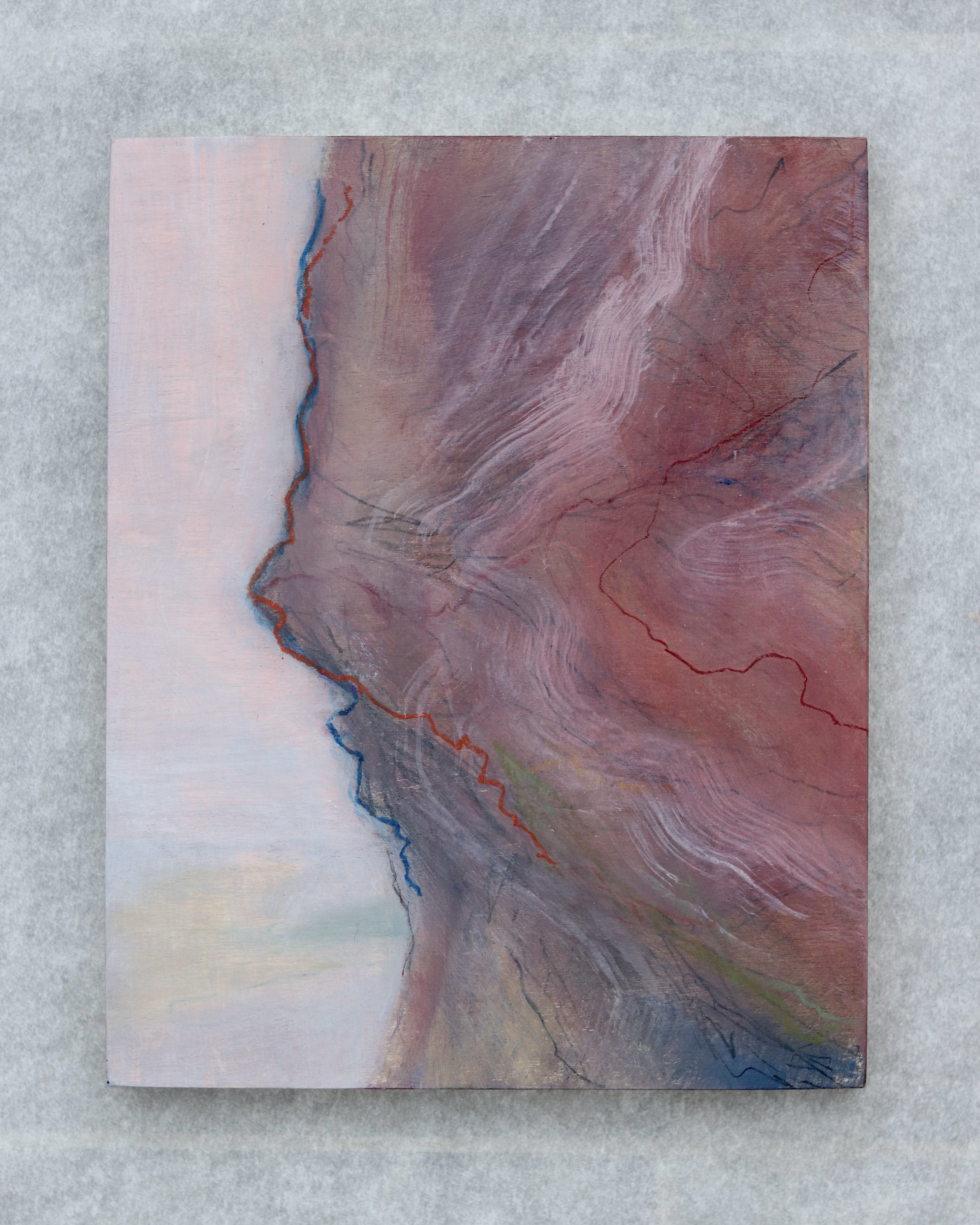 painting of a rock face with red, purples and blues