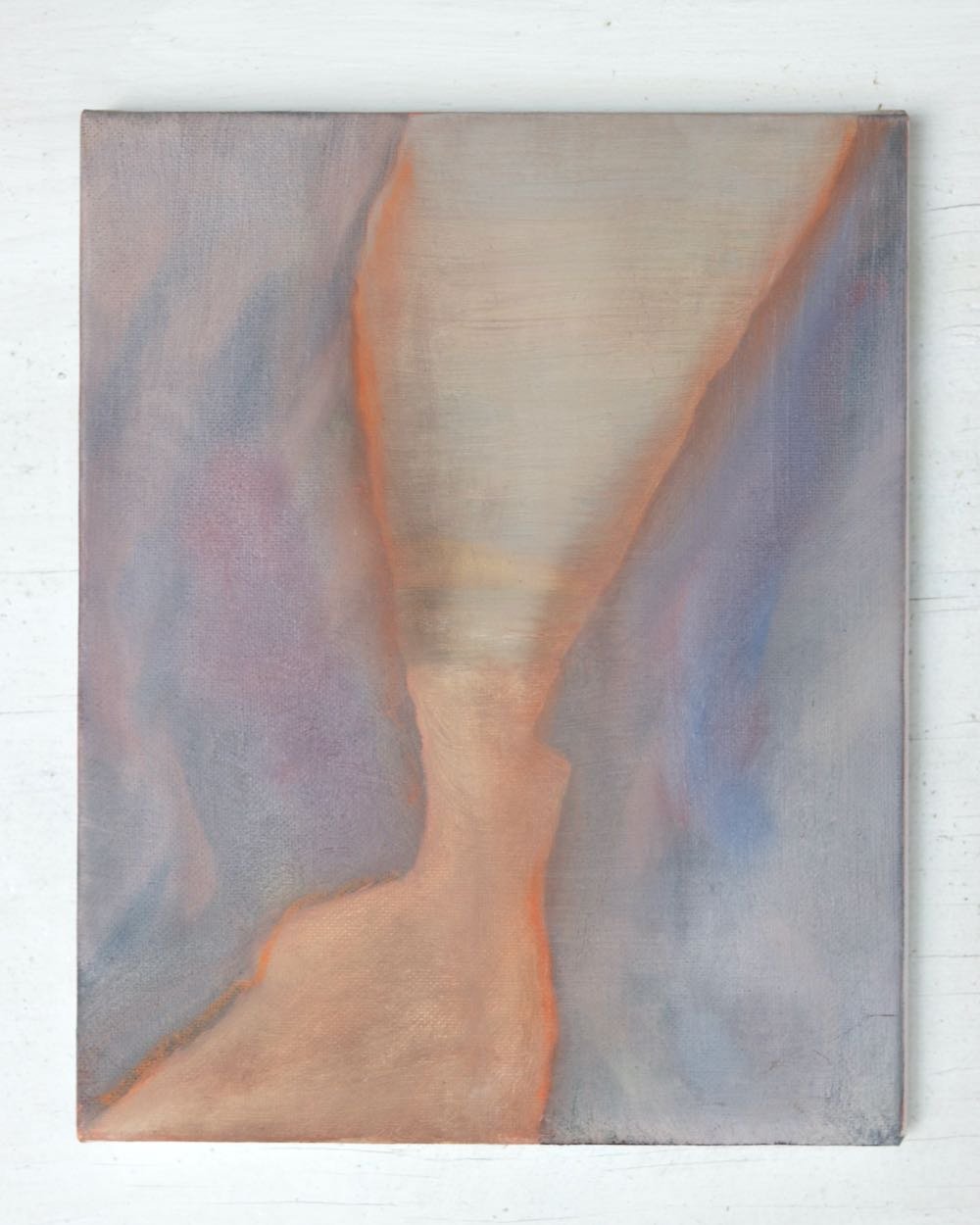 abstract landscape showing a narrow passage between two cliff faces with blue and orange colours