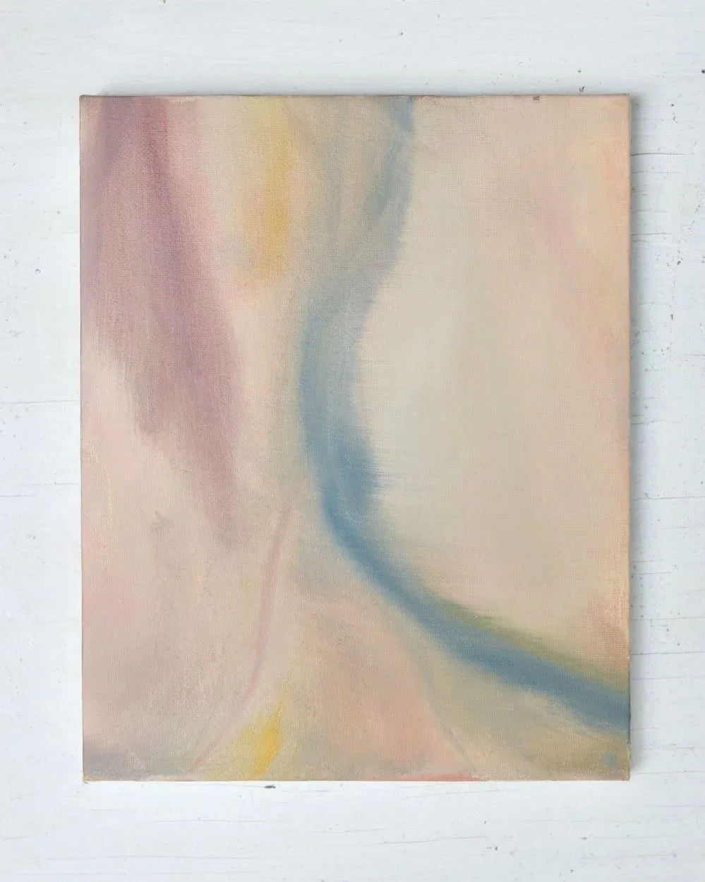 abstract painting with beige background, yellow, pink and blue shapes
