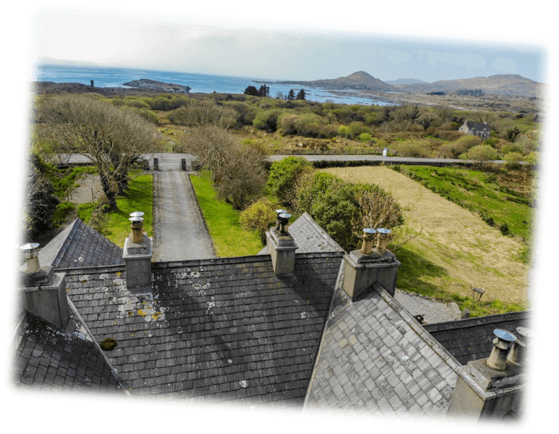 A view from a rooftop overlooking the Irish Atlantic coast County Kerry's distant mountains.