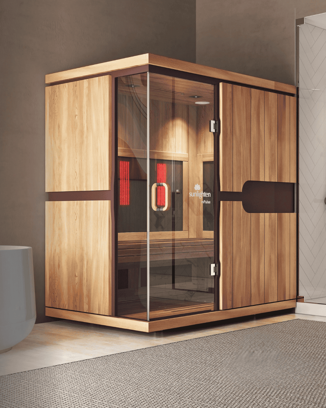 Interior of an infrared sauna with red lighting and wood paneling, used for recovery and wellness sessions at Uplift Wellness.
