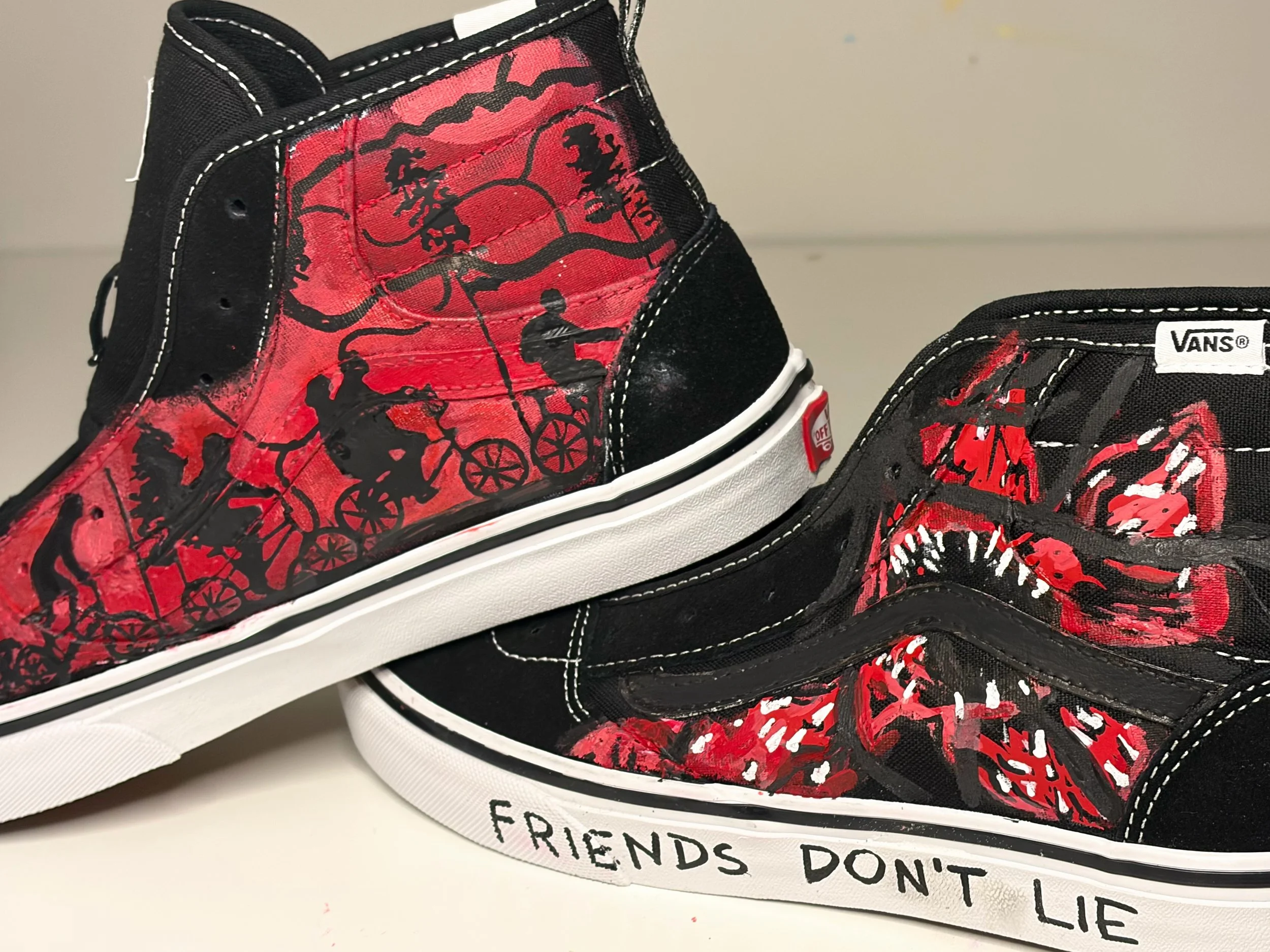 Shoes painted with artwork from a discontinued Vans model