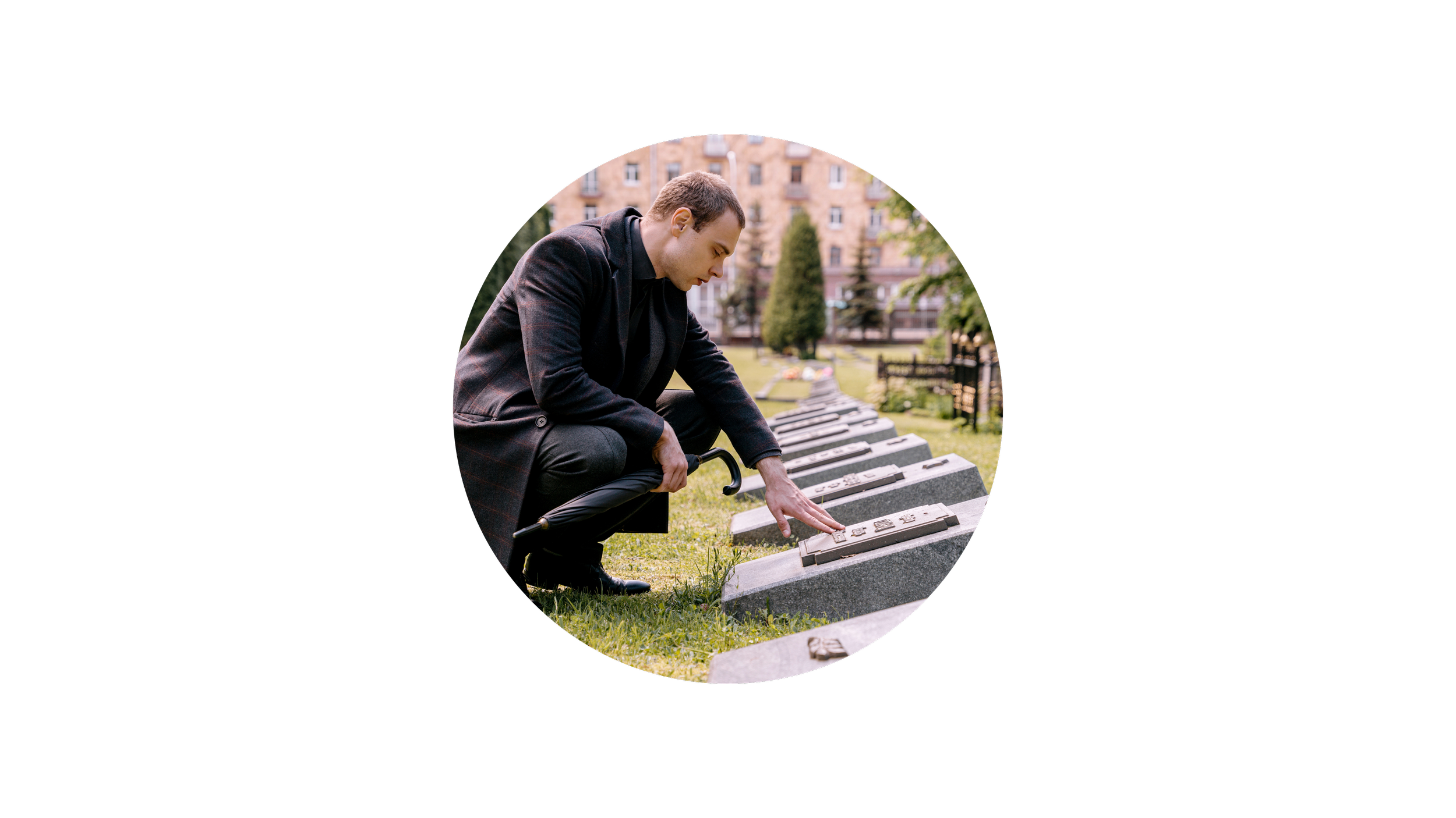 Man kneeling at grave
