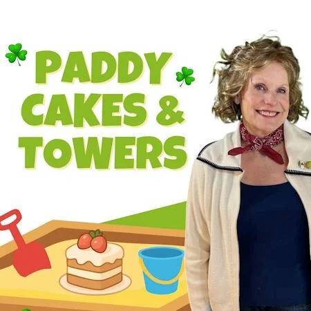 woman standing next to a sandbox