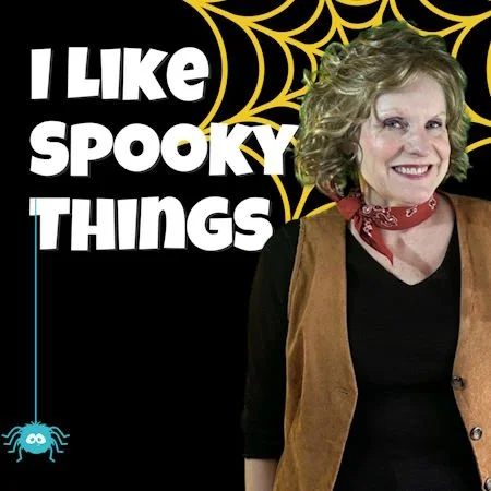 Smiling women infront of a spider web