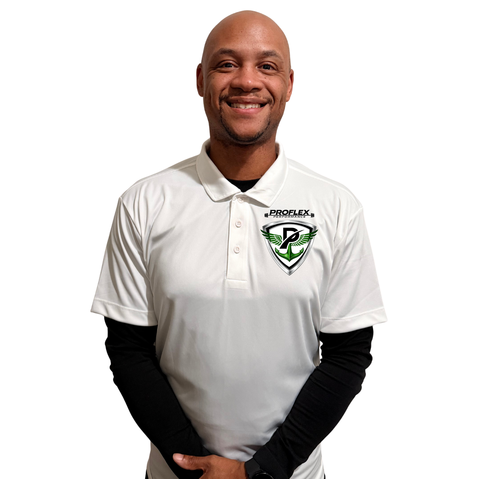 Portrait of a smiling African American man in a white polo shirt with black sleeves and logo, standing against a white background.