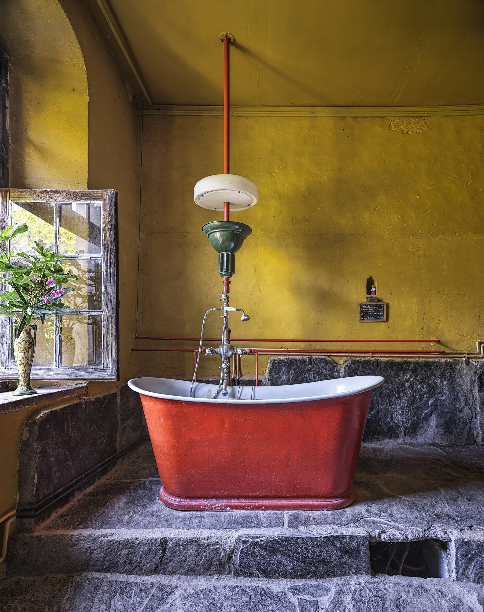 Photography by studio Mel Yates featuring a bath tub in a rustic building
