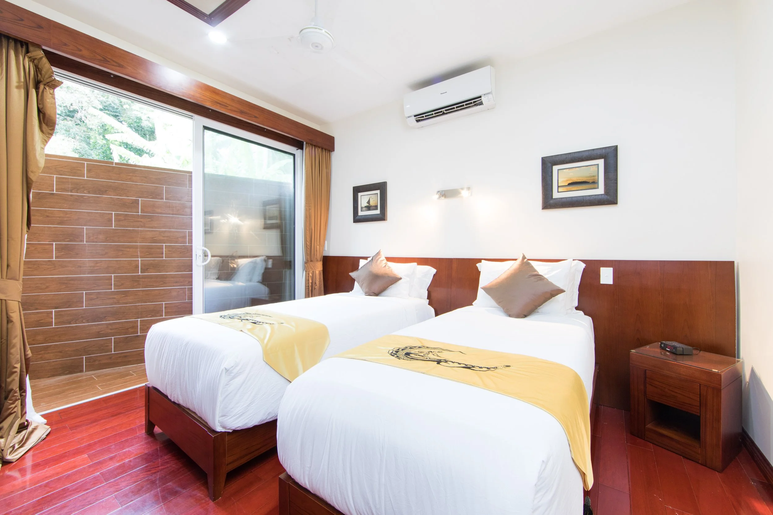 Villa 4 second bedroom with 2 king single beds that can be joined into a king sized bed