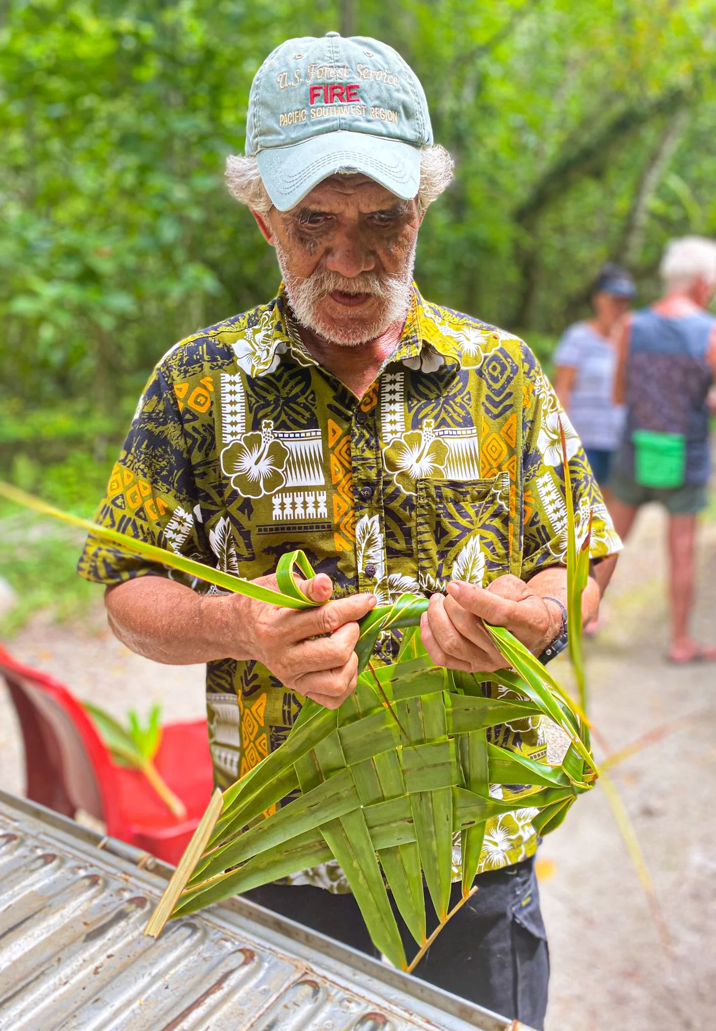 Atiu - Birdman George Weaving Cook Islands Tourism.jpg