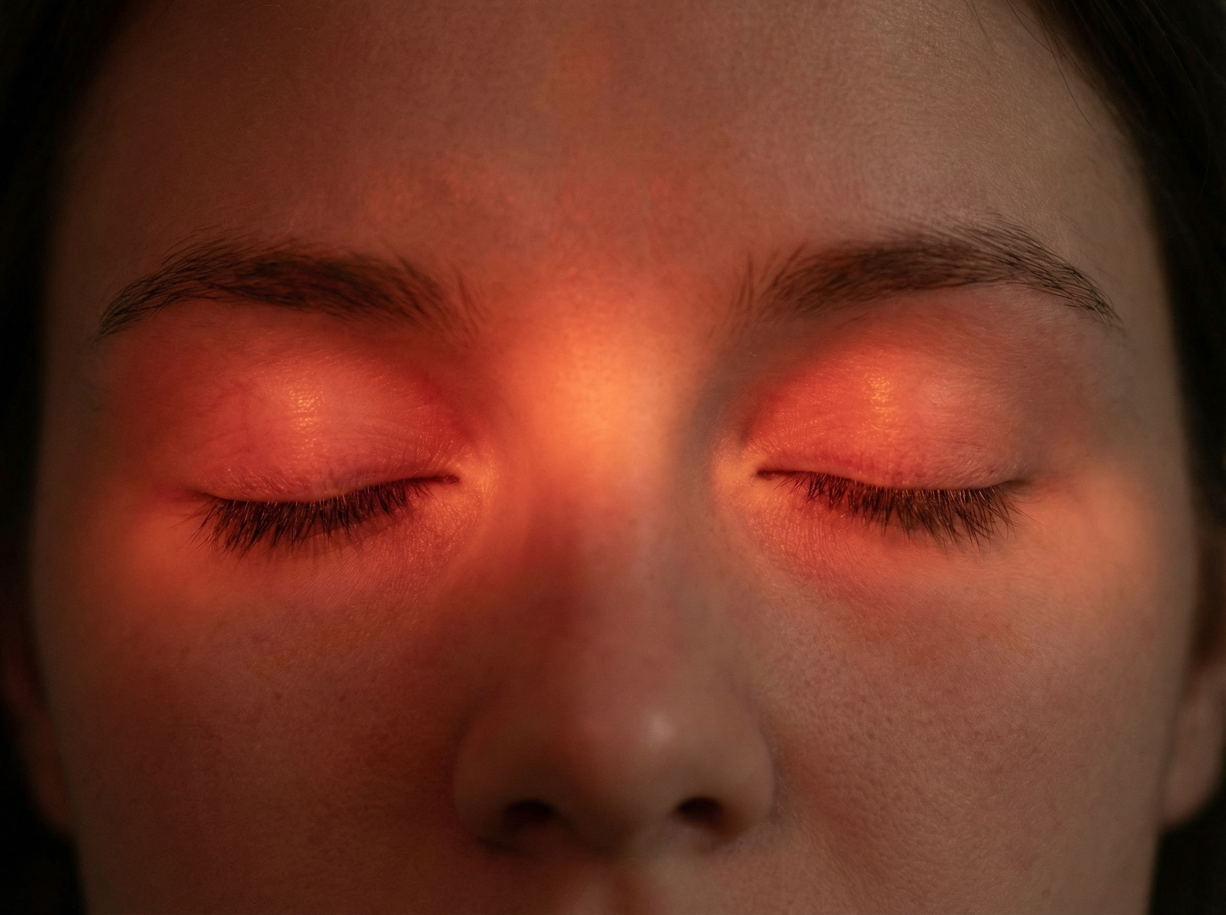 Firefly_Red lights come into closed eyes.  400732.png