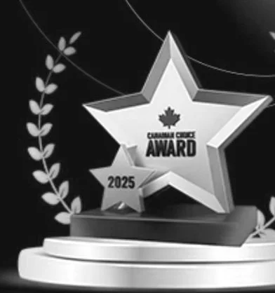 A trophy with a star shape that has the Canadian crest and the word "Award" on it, a smaller star with "2025" inscribed, set on a circular white platform with decorative leaves in the background.