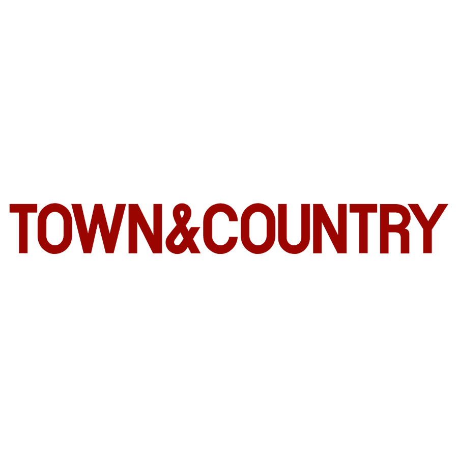 The words "TOWN & COUNTRY" written in bold, dark red font on a white background.