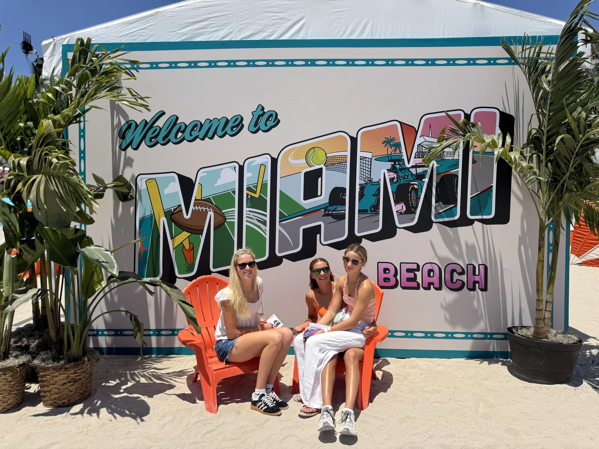 Welcome to Miami Beach sign with family at Grand Prix weekend