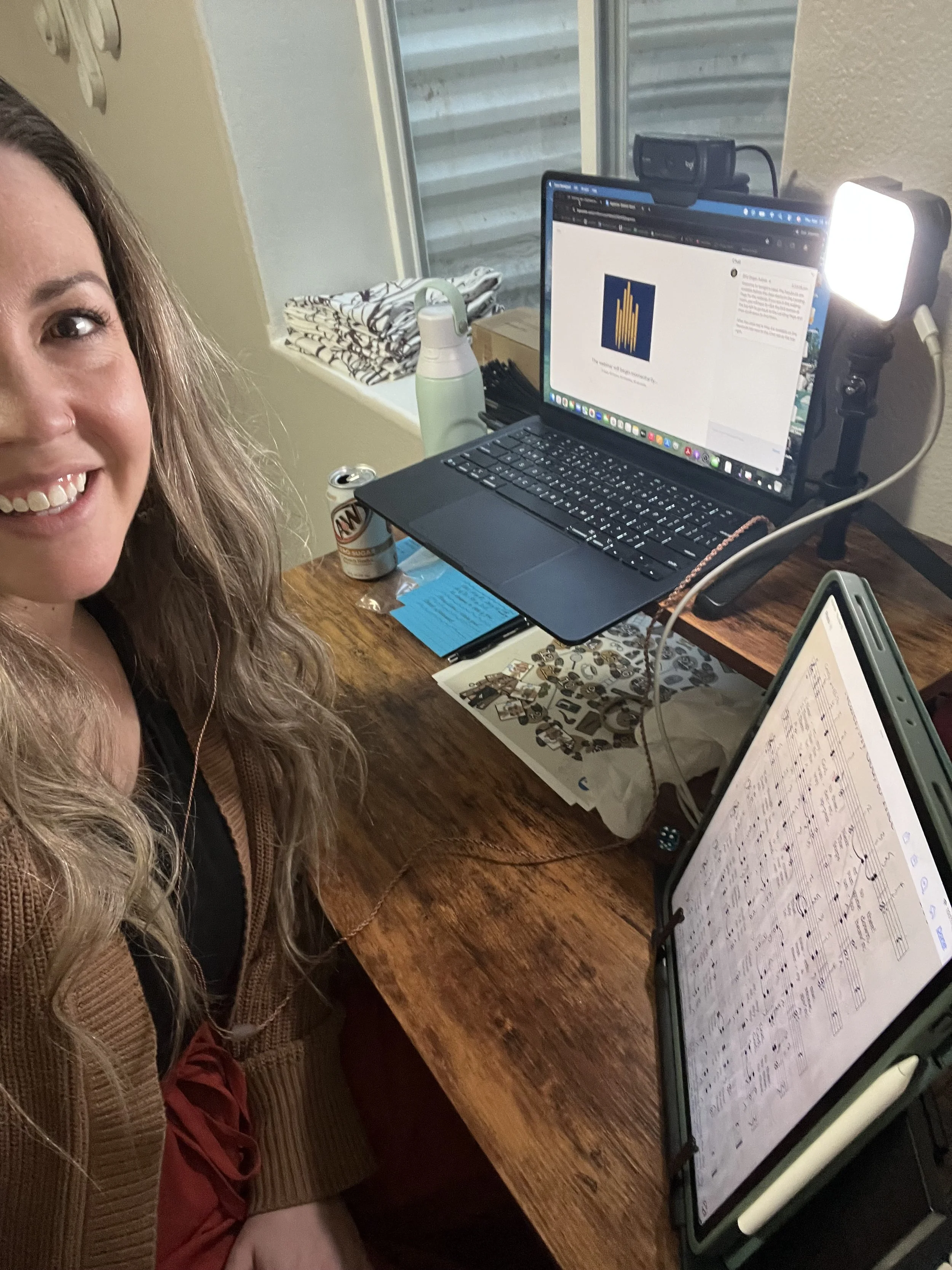 Brittany Brown creating custom lesson materials and music resources for piano students.