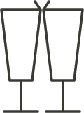 Two glasses of beer clinking together