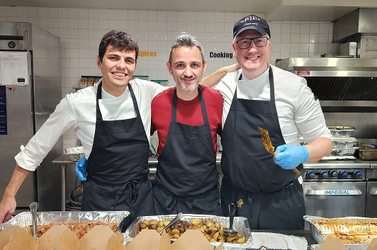 Volunteers of HoFoCo prepping meals
