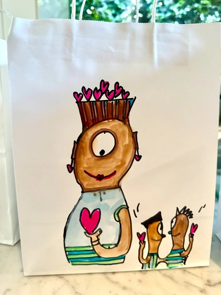 Hand-drawn illustration of a woman with brown hair pulled back, holding a pink heart, surrounded by three smaller figures with brown hair, one with a flipped hairstyle, all holding pink hearts, on a white background.